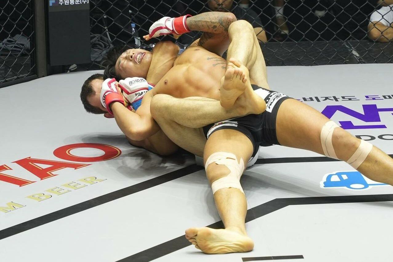 Ким Ин Сон против Камиля Маматхановича Магомедова